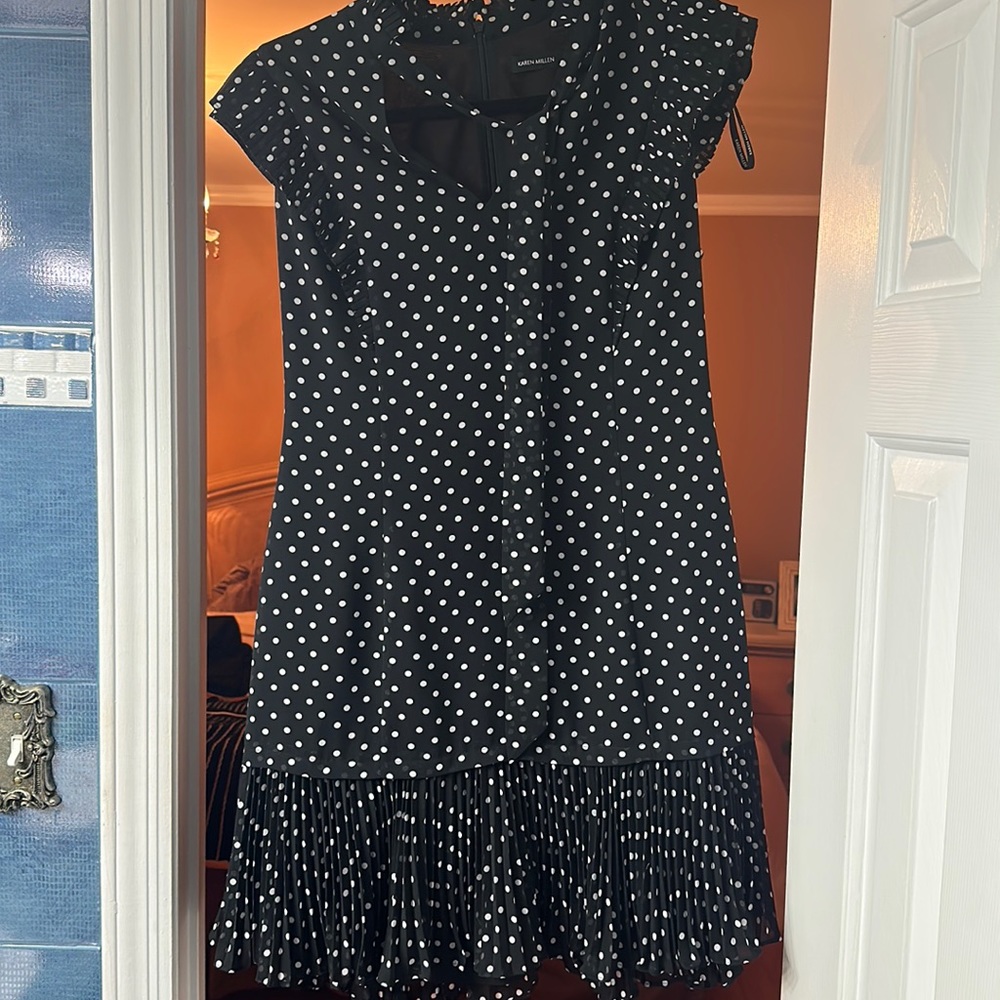 Karen Millen comes with built in scarf. Size 8. Mini.
